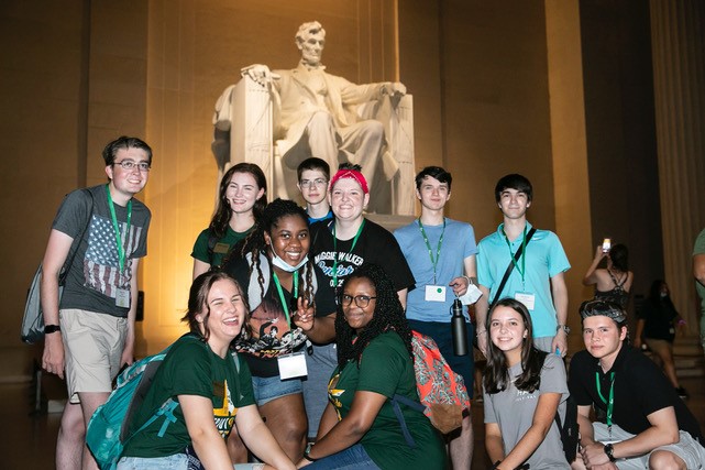 George Mason University students join together at the Abraham Lincoln statue in Washington D.C. during Quill Camp: Republic