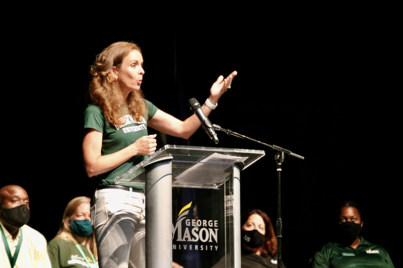 Schar School’s Jennifer Victor makes a speech from the podium.