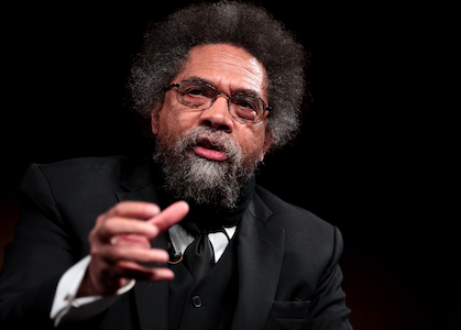 Cornel West gestures to the camera.