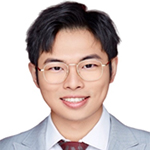 Zifu Wang smiling while wearing glasses, a gray suit, white shirt, and red tie.
